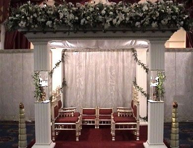 roman mandap with flowers